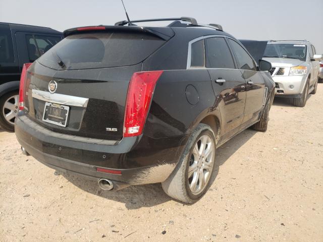 Photo 3 VIN: 3GYFNCE32ES662446 - CADILLAC SRX PERFOR 