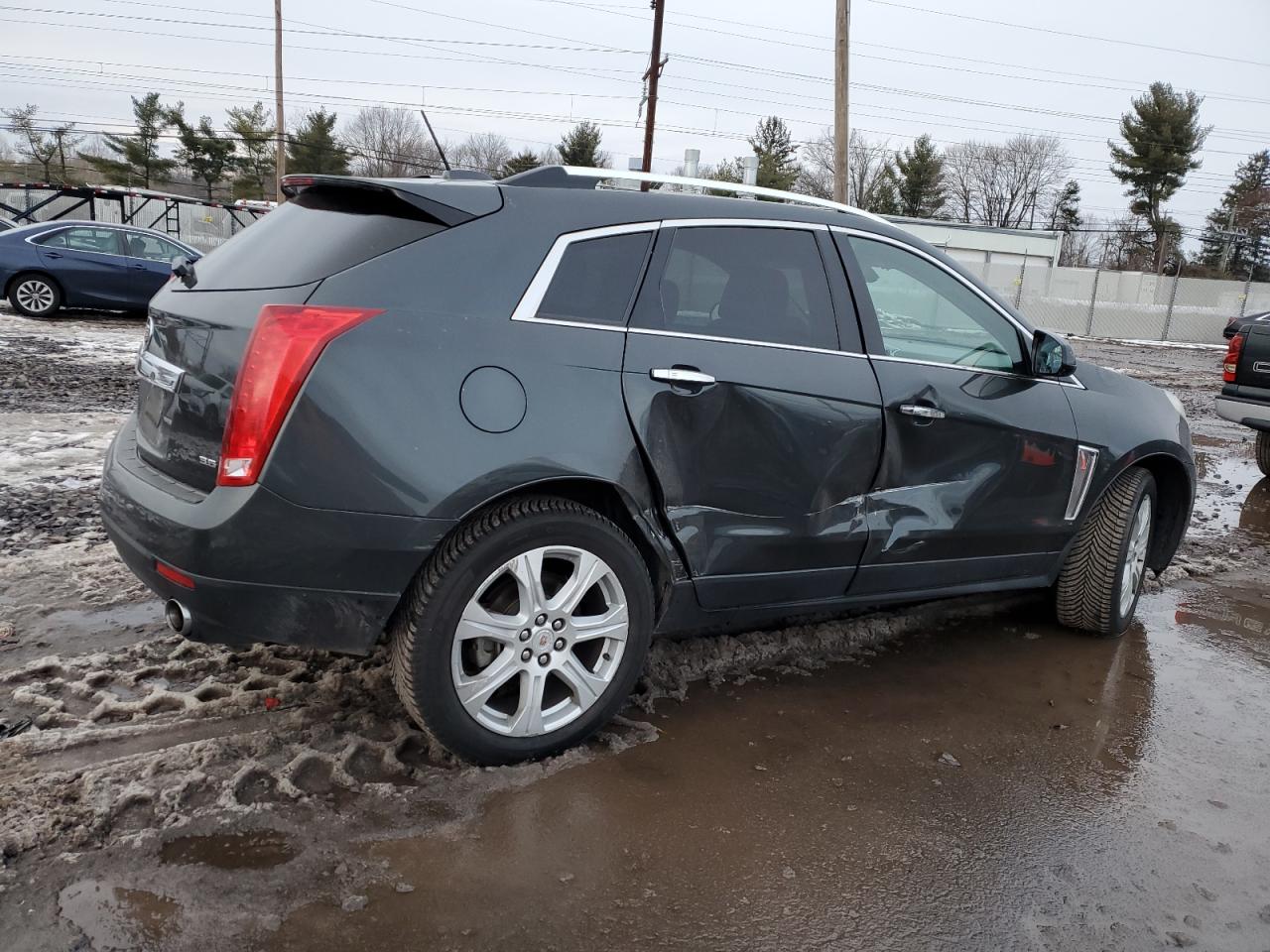 Photo 2 VIN: 3GYFNCE32GS551124 - CADILLAC SRX 