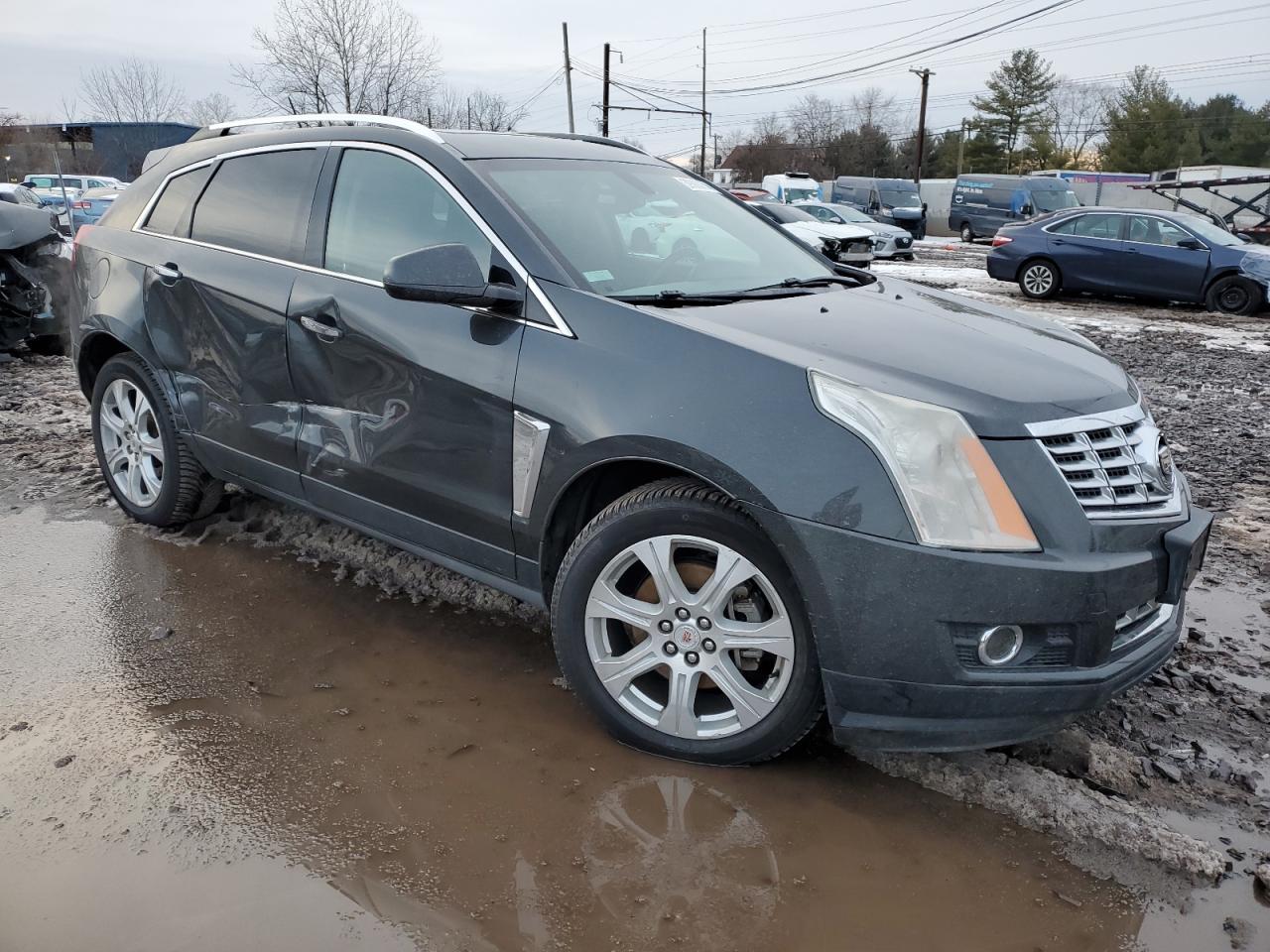 Photo 3 VIN: 3GYFNCE32GS551124 - CADILLAC SRX 