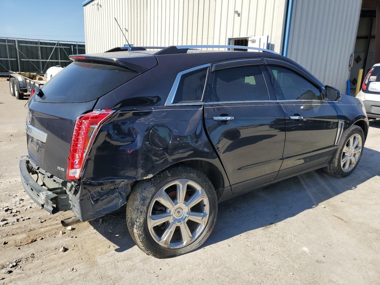 Photo 2 VIN: 3GYFNCE33GS546515 - CADILLAC SRX 