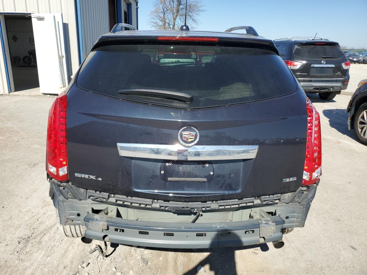 Photo 5 VIN: 3GYFNCE33GS546515 - CADILLAC SRX 