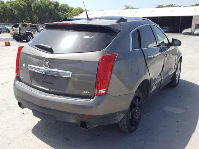 Photo 3 VIN: 3GYFNCE34CS627971 - CADILLAC SRX PREMIU 