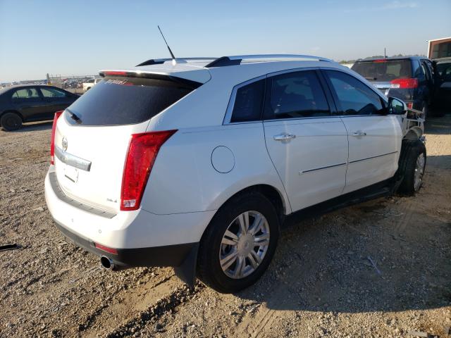 Photo 3 VIN: 3GYFNCE34DS596366 - CADILLAC SRX LUXURY 