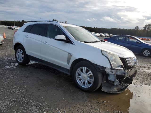 Photo 3 VIN: 3GYFNCE34ES628136 - CADILLAC SRX PERFOR 