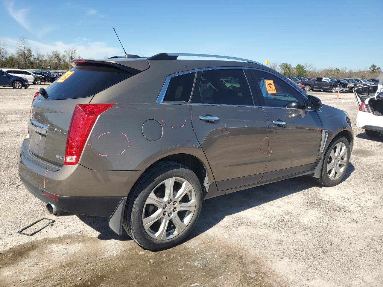 Photo 2 VIN: 3GYFNCE34GS535023 - CADILLAC SRX 