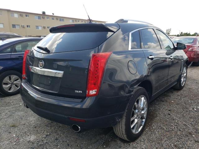 Photo 3 VIN: 3GYFNCE35ES681038 - CADILLAC SRX PERFOR 