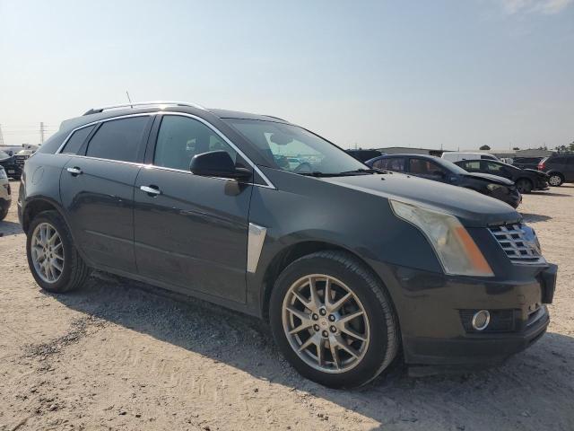 Photo 3 VIN: 3GYFNCE36ES544464 - CADILLAC SRX PERFOR 