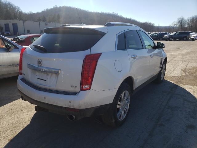 Photo 3 VIN: 3GYFNCE37DS527283 - CADILLAC SRX LUXURY 