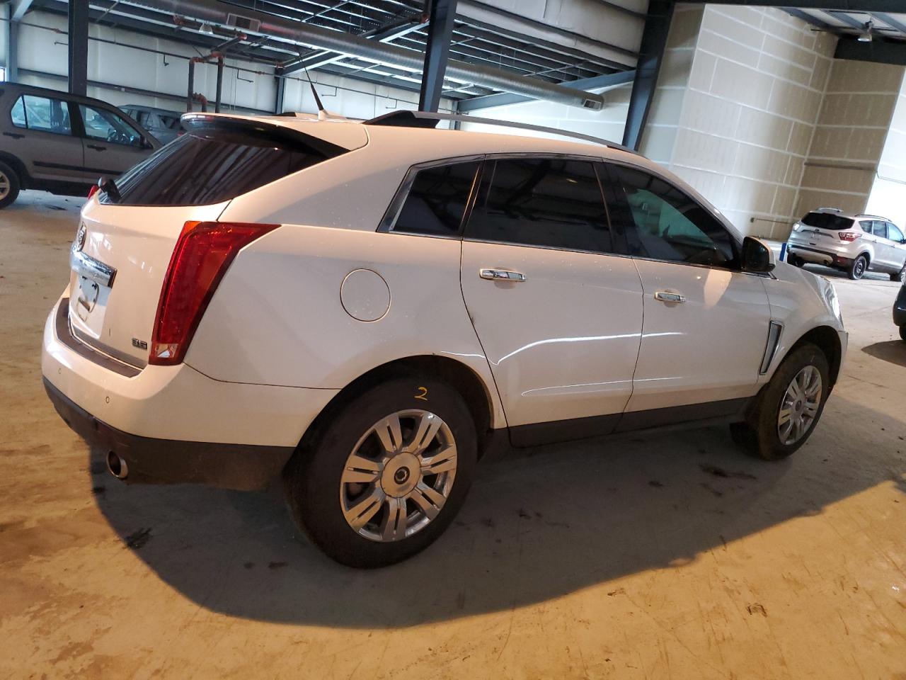 Photo 2 VIN: 3GYFNCE37DS574944 - CADILLAC SRX 