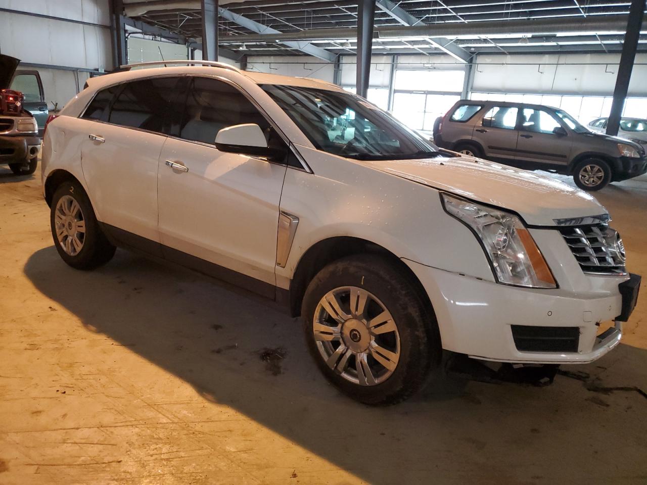 Photo 3 VIN: 3GYFNCE37DS574944 - CADILLAC SRX 