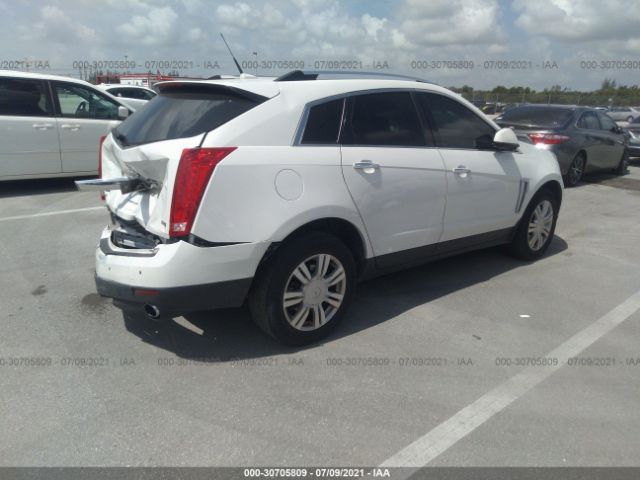 Photo 3 VIN: 3GYFNCE37DS597138 - CADILLAC SRX 