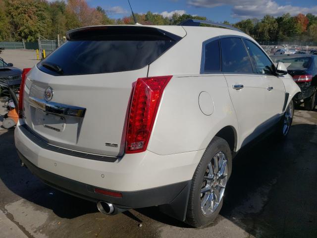 Photo 3 VIN: 3GYFNCE37ES565890 - CADILLAC SRX PERFOR 