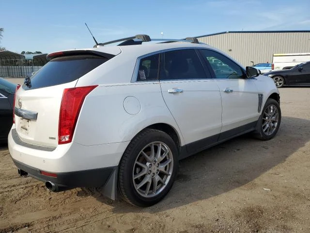 Photo 2 VIN: 3GYFNCE37ES664550 - CADILLAC SRX PERFOR 