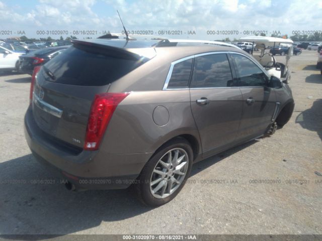 Photo 3 VIN: 3GYFNCE38ES583069 - CADILLAC SRX 