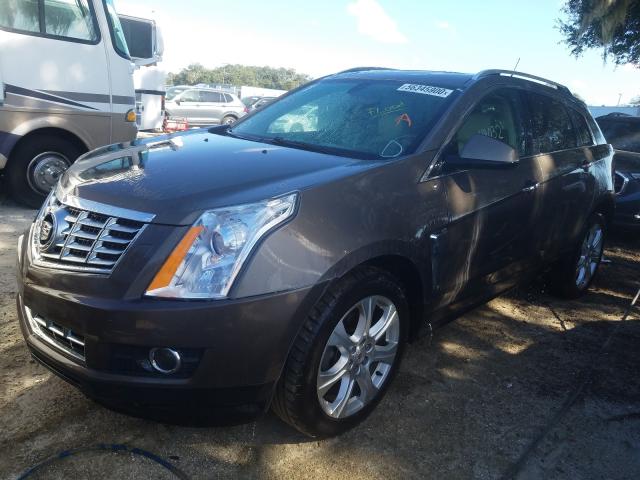 Photo 1 VIN: 3GYFNCE38ES613607 - CADILLAC SRX PERFOR 