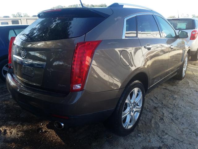 Photo 3 VIN: 3GYFNCE38ES613607 - CADILLAC SRX PERFOR 