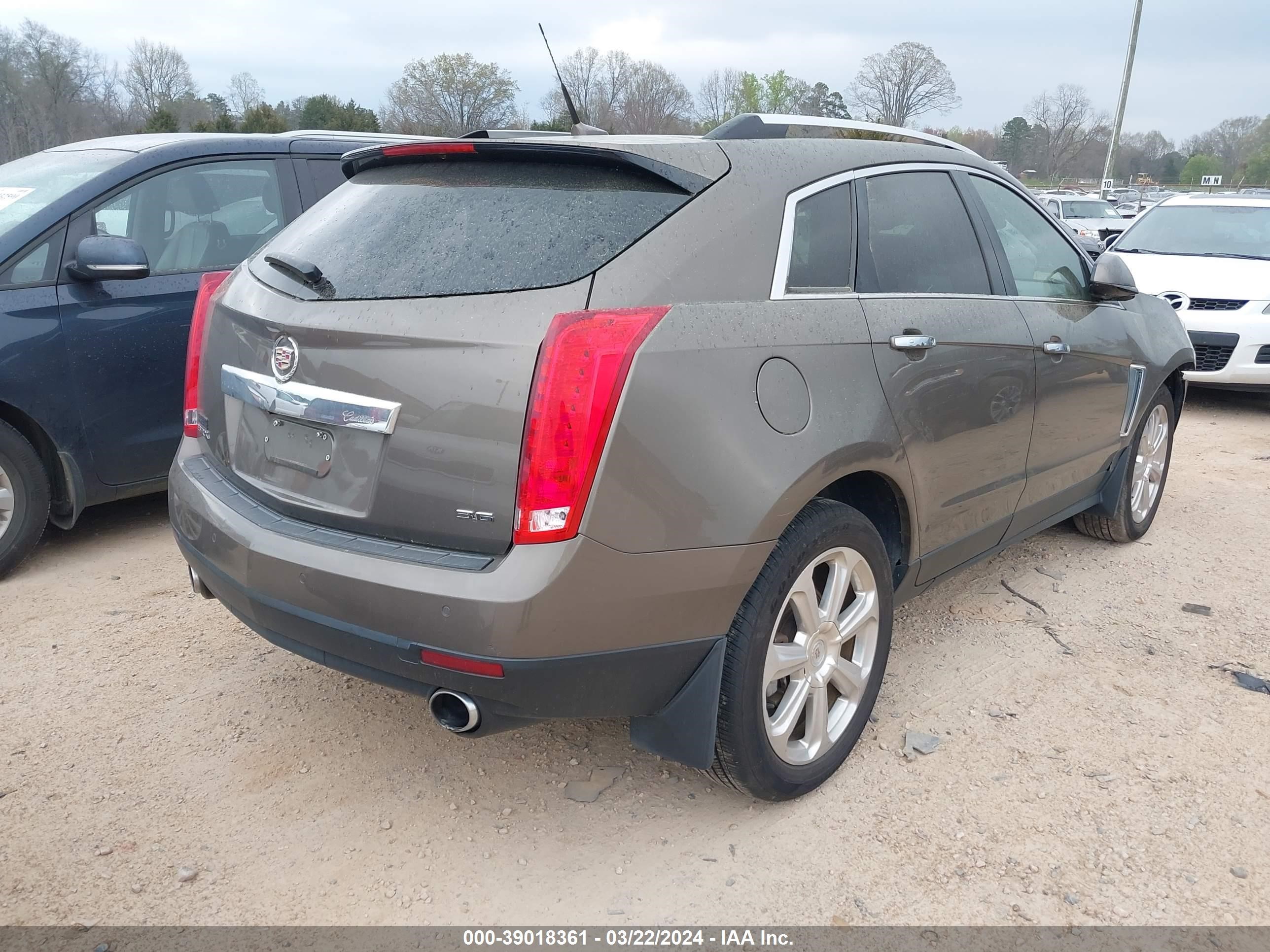 Photo 3 VIN: 3GYFNCE38ES652312 - CADILLAC SRX 