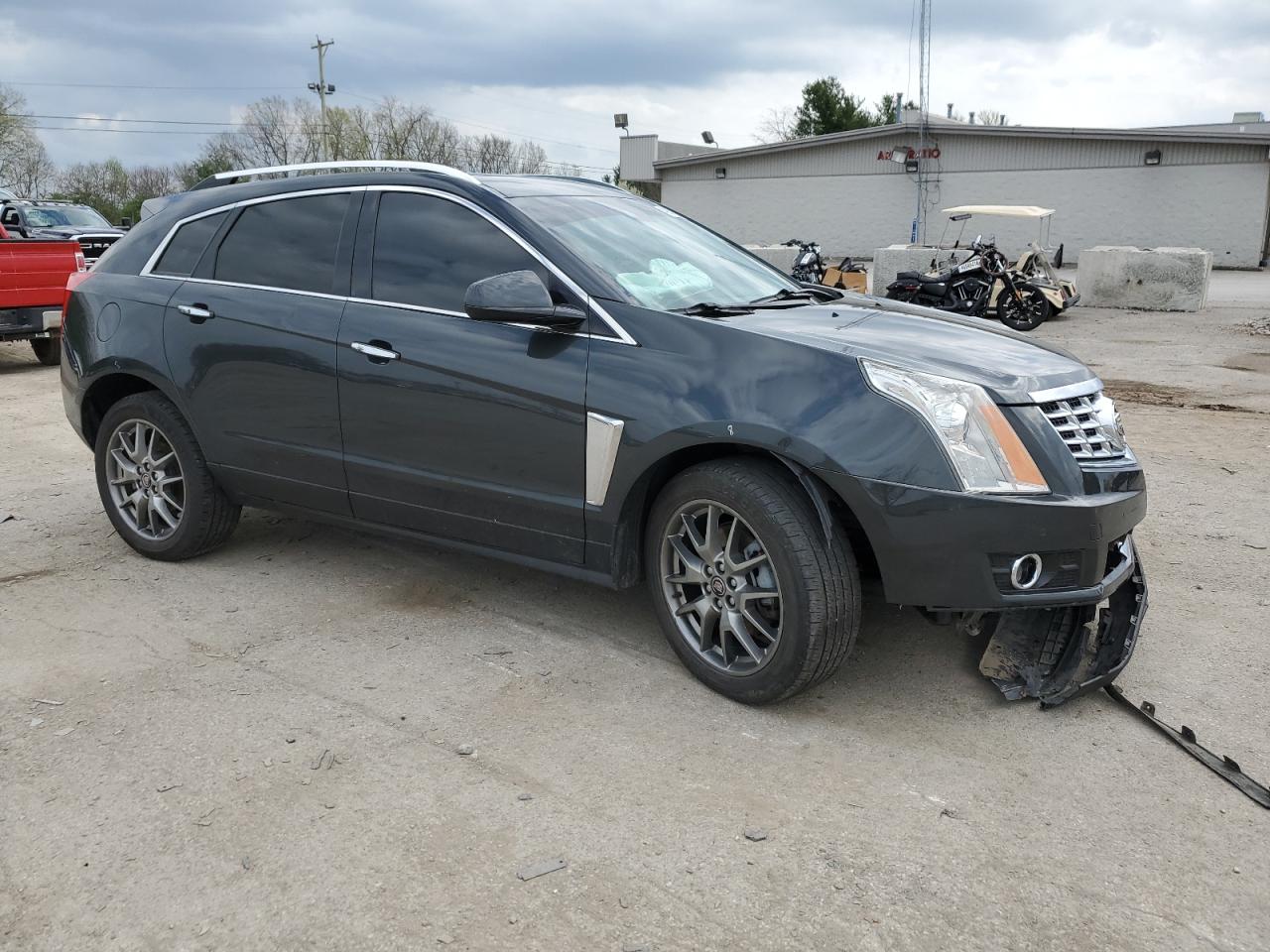 Photo 3 VIN: 3GYFNCE38FS529983 - CADILLAC SRX 