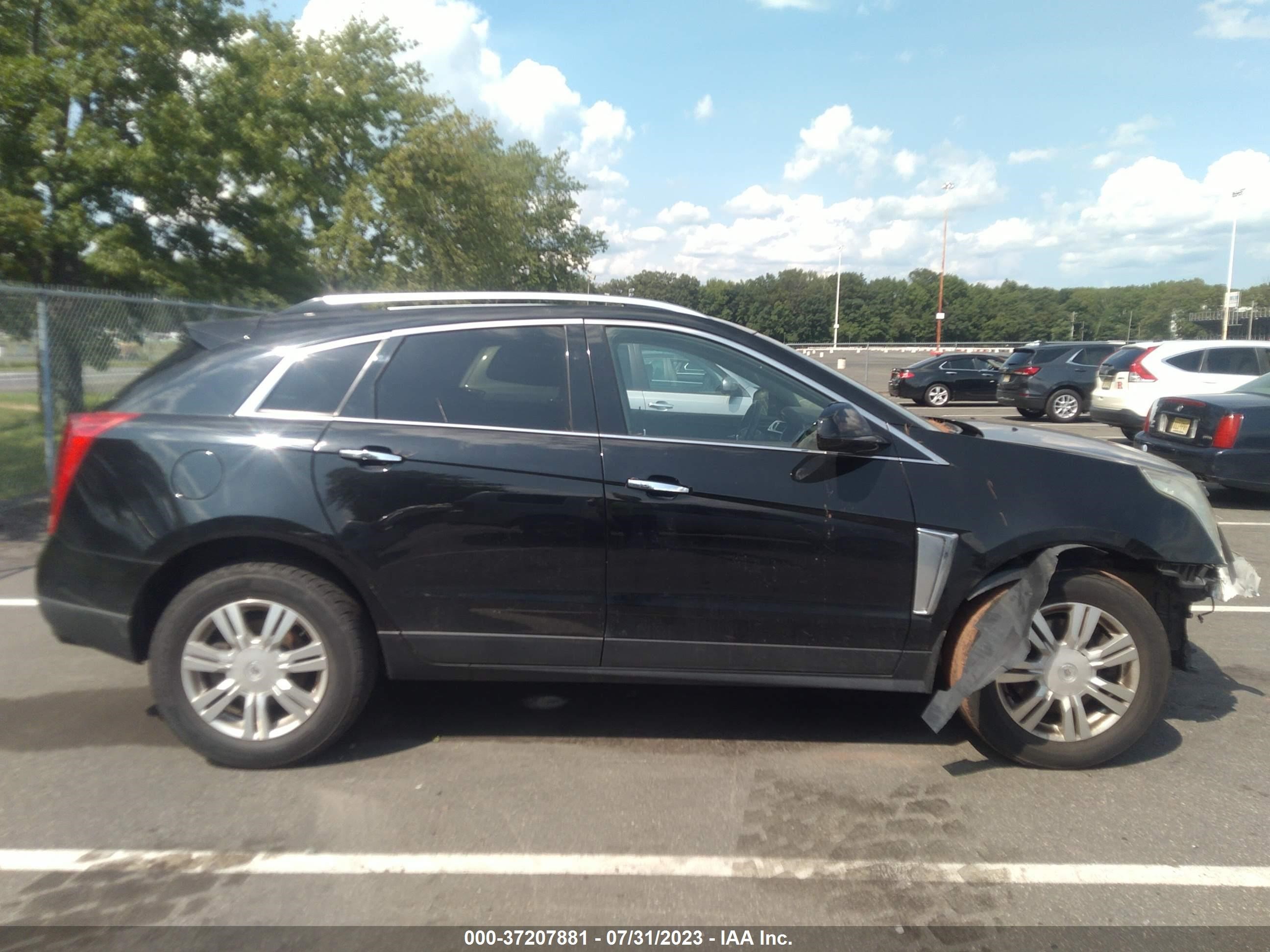 Photo 12 VIN: 3GYFNCE39DS538706 - CADILLAC SRX 