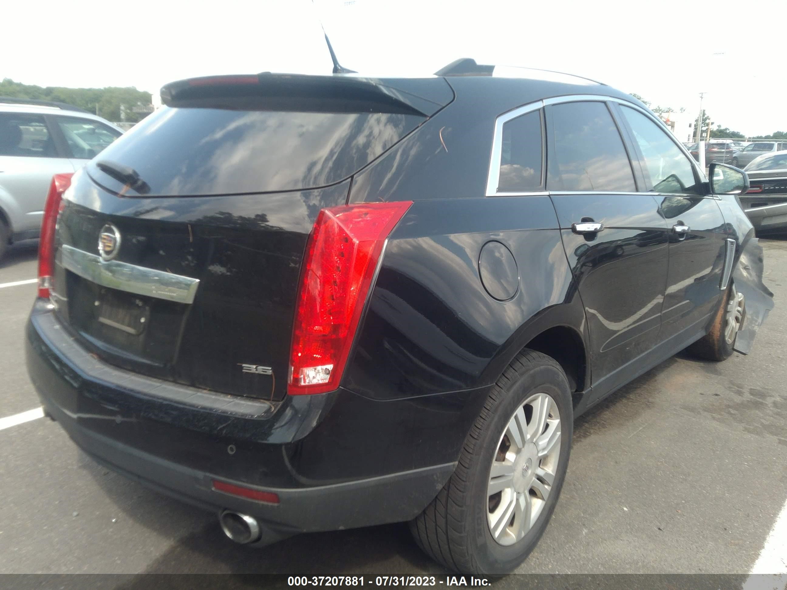 Photo 3 VIN: 3GYFNCE39DS538706 - CADILLAC SRX 