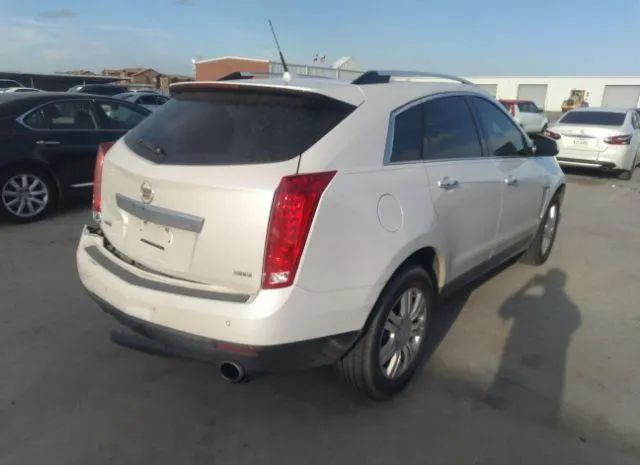 Photo 3 VIN: 3GYFNCE39DS642399 - CADILLAC SRX 