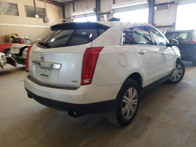 Photo 3 VIN: 3GYFNCE39DS643679 - CADILLAC SRX LUXURY 