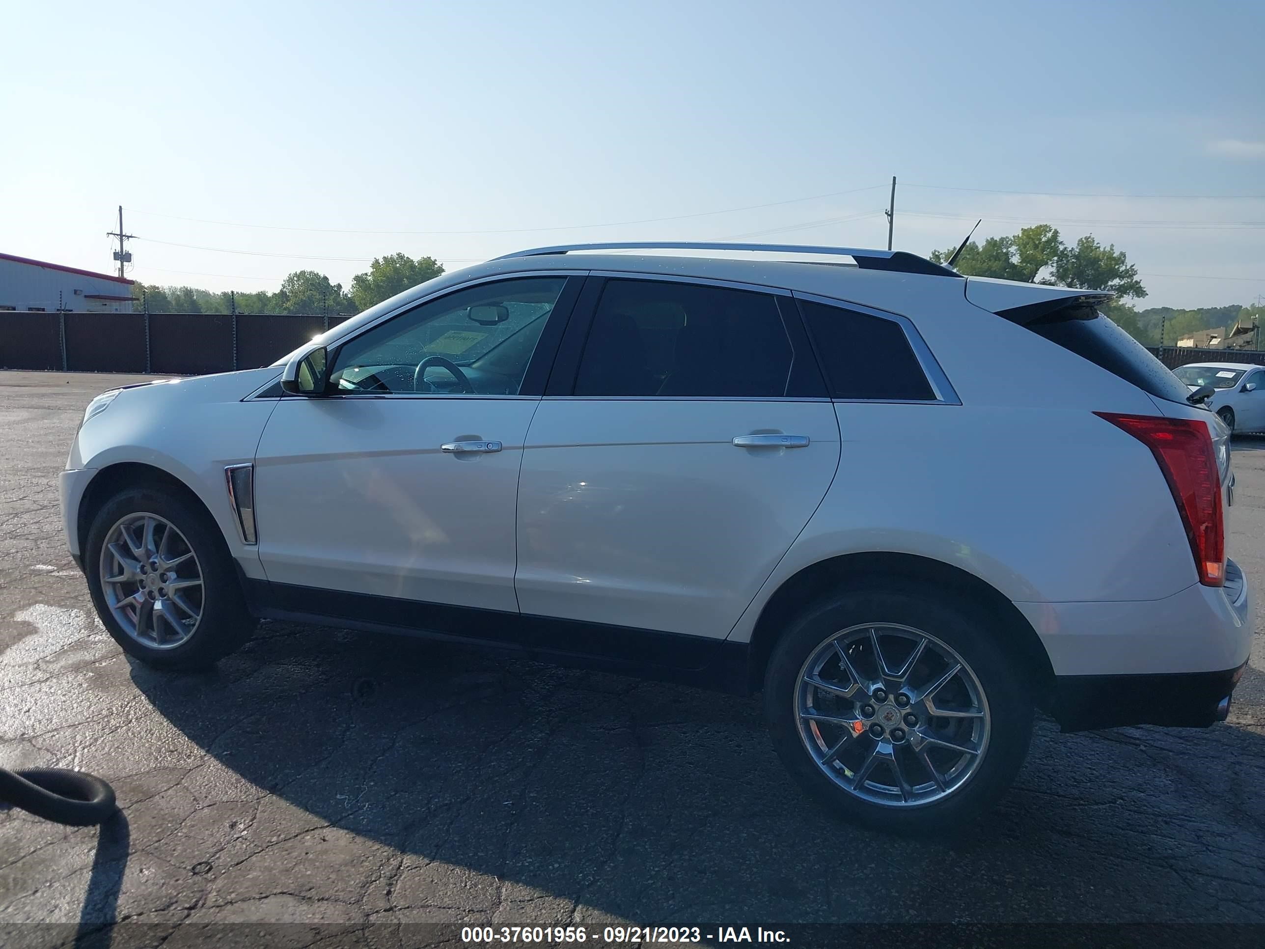 Photo 13 VIN: 3GYFNCE39ES547360 - CADILLAC SRX 