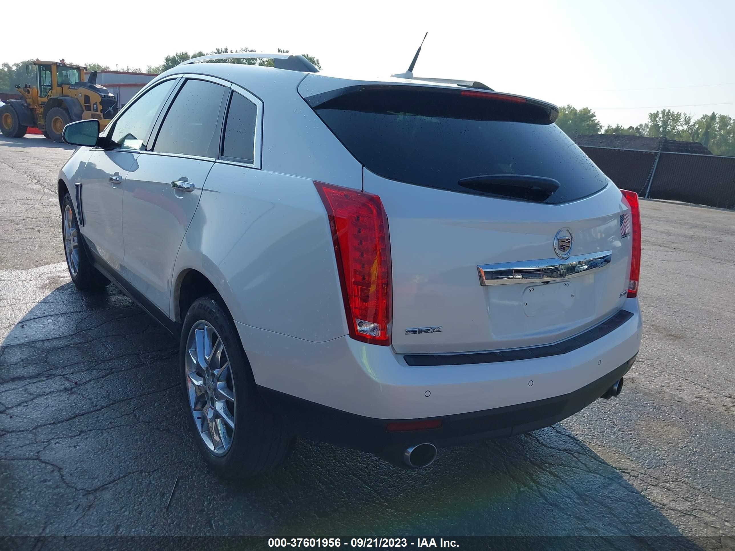 Photo 2 VIN: 3GYFNCE39ES547360 - CADILLAC SRX 