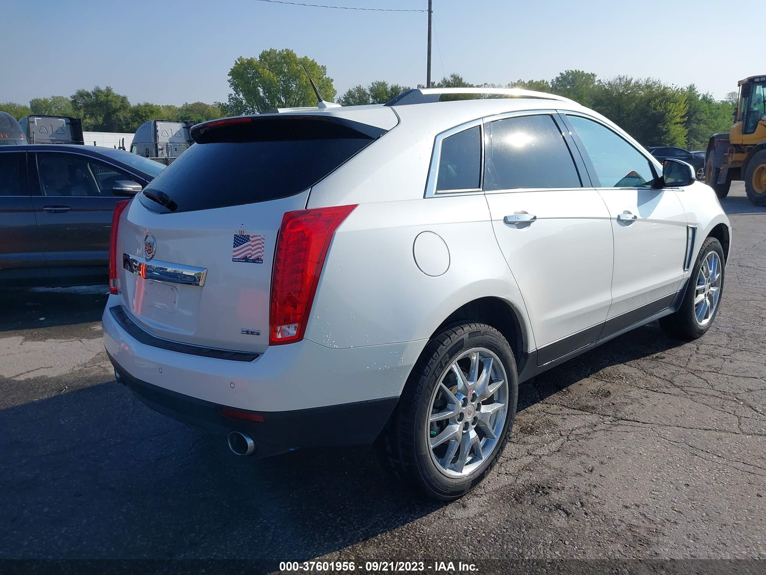 Photo 3 VIN: 3GYFNCE39ES547360 - CADILLAC SRX 