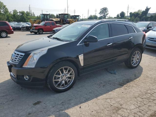 Photo 0 VIN: 3GYFNCE39ES565843 - CADILLAC SRX PERFOR 