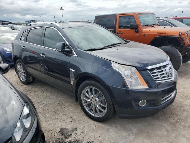 Photo 3 VIN: 3GYFNCE39ES578415 - CADILLAC SRX PERFOR 