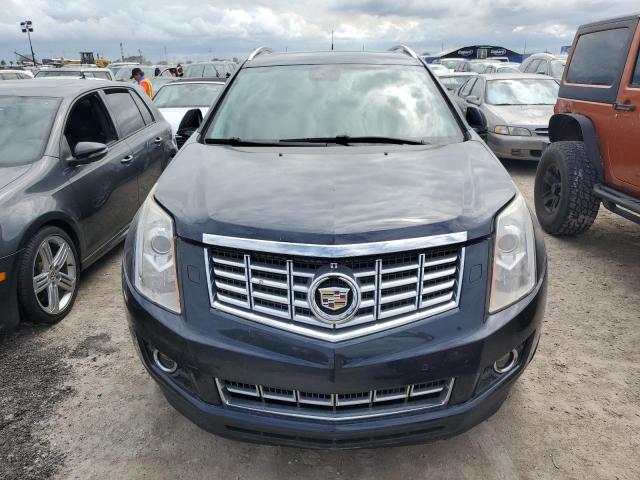 Photo 4 VIN: 3GYFNCE39ES578415 - CADILLAC SRX PERFOR 