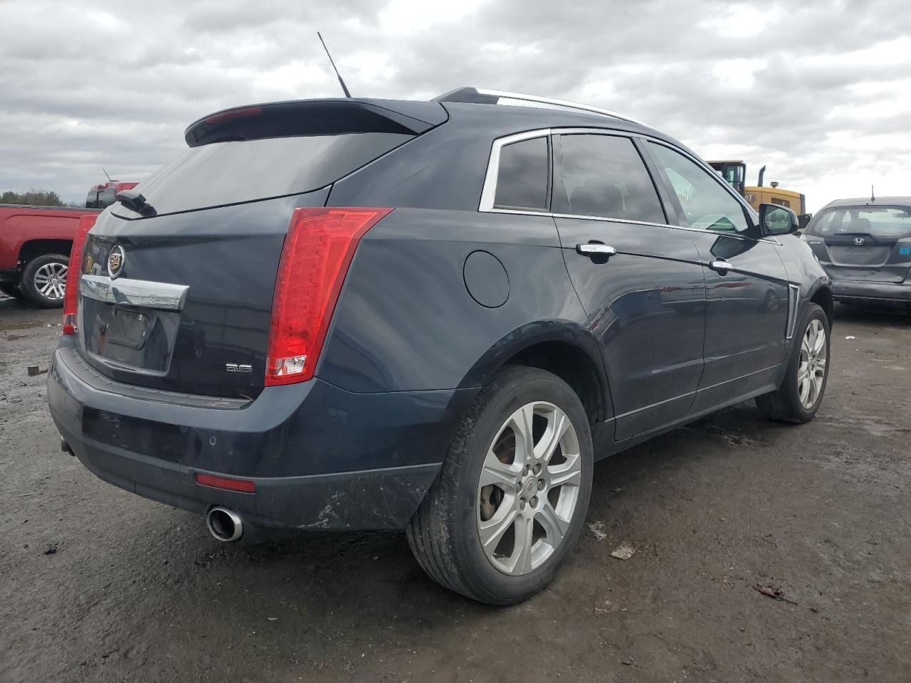 Photo 2 VIN: 3GYFNCE39ES613051 - CADILLAC SRX 