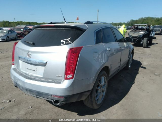 Photo 3 VIN: 3GYFNCE39ES640900 - CADILLAC SRX 