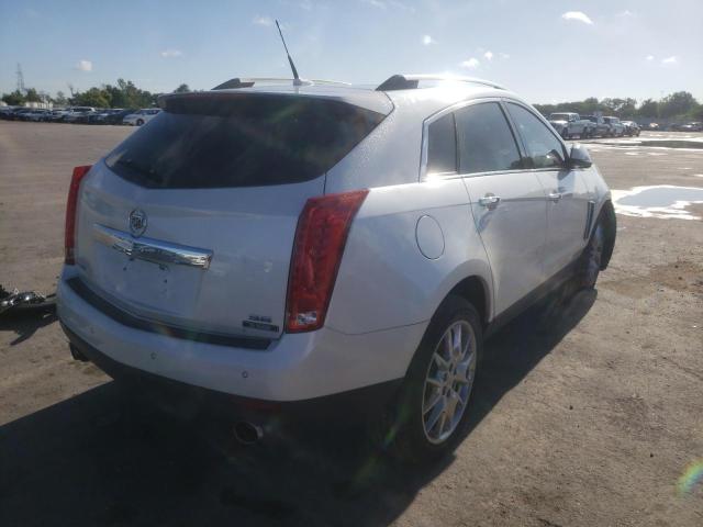 Photo 3 VIN: 3GYFNCE39ES677154 - CADILLAC SRX PERFOR 