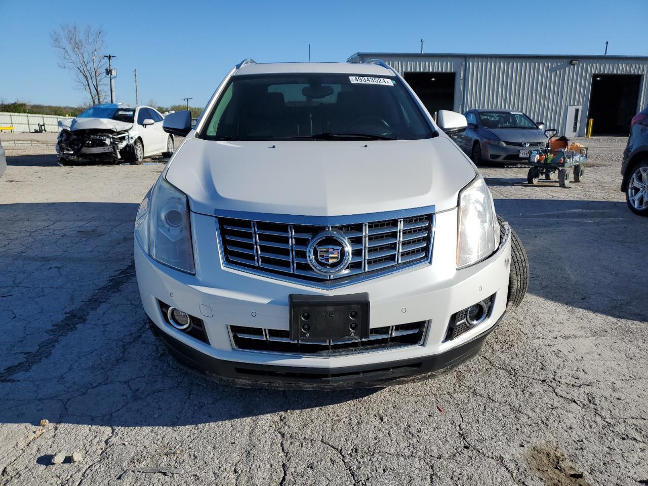 Photo 4 VIN: 3GYFNCE39GS528892 - CADILLAC SRX 