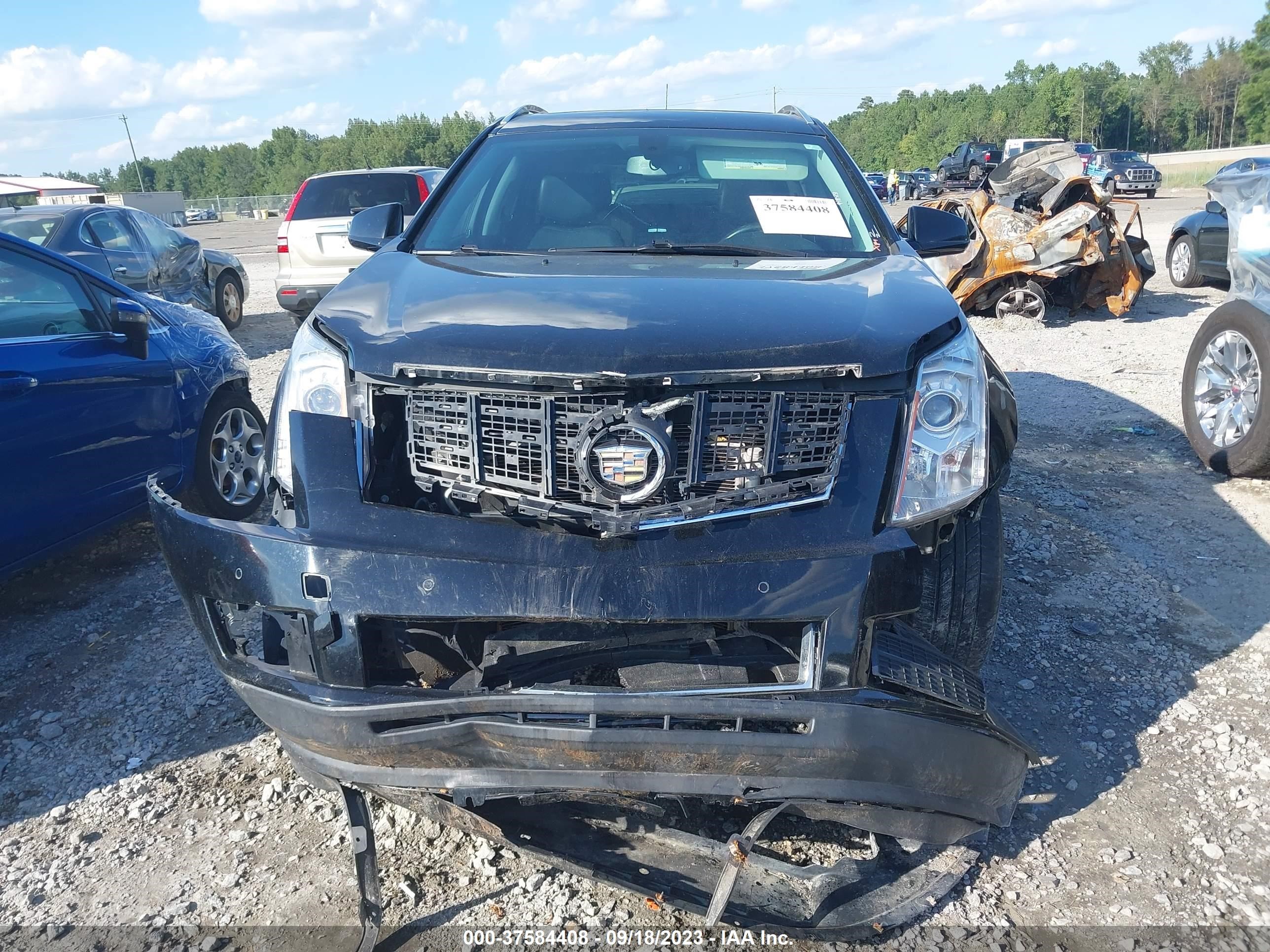 Photo 11 VIN: 3GYFNCE3XDS625286 - CADILLAC SRX 