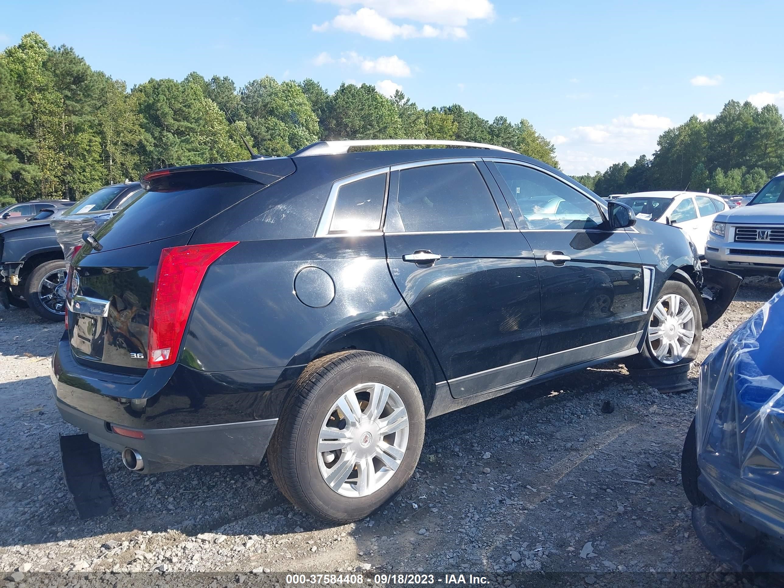 Photo 12 VIN: 3GYFNCE3XDS625286 - CADILLAC SRX 