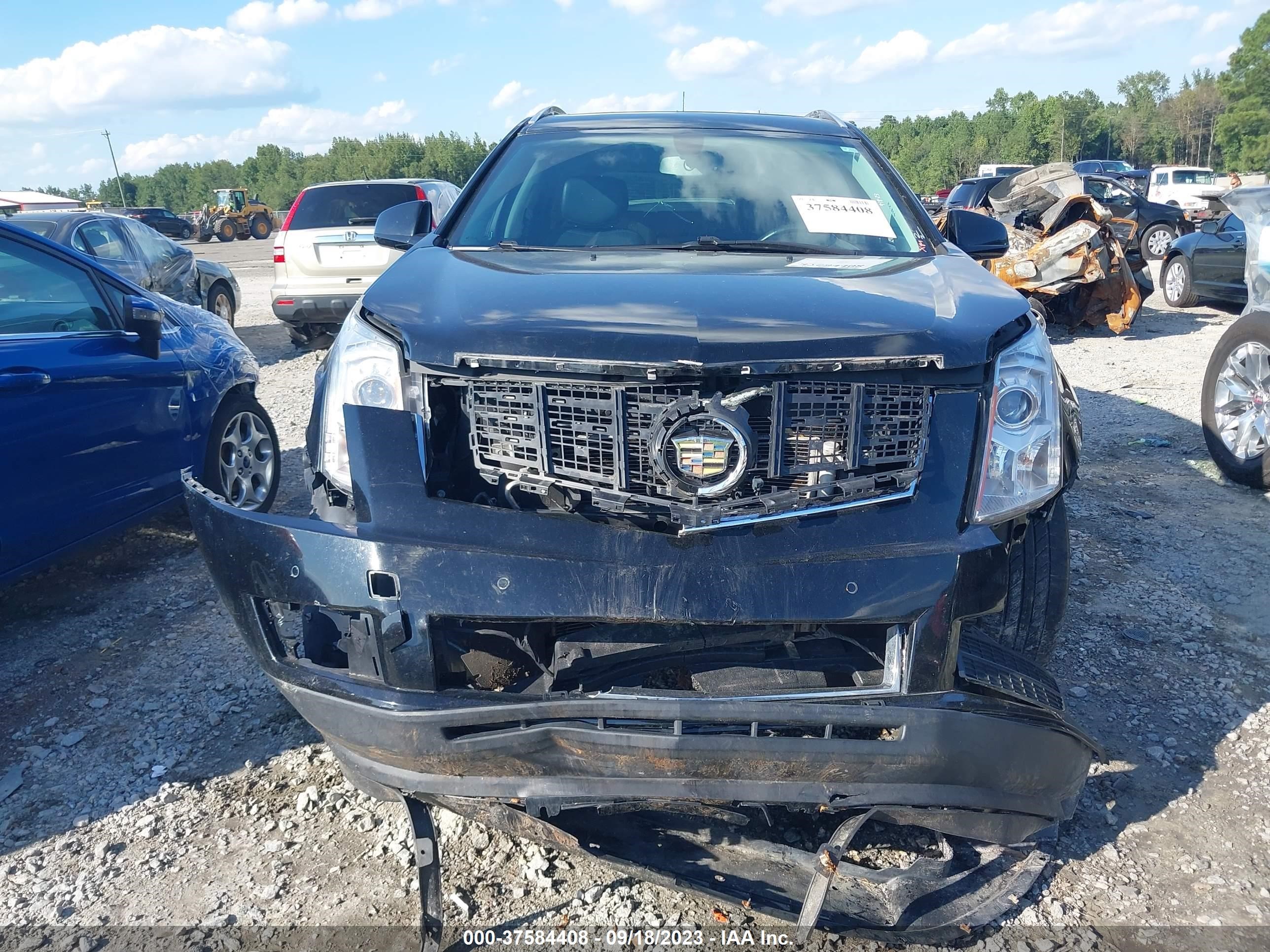 Photo 5 VIN: 3GYFNCE3XDS625286 - CADILLAC SRX 