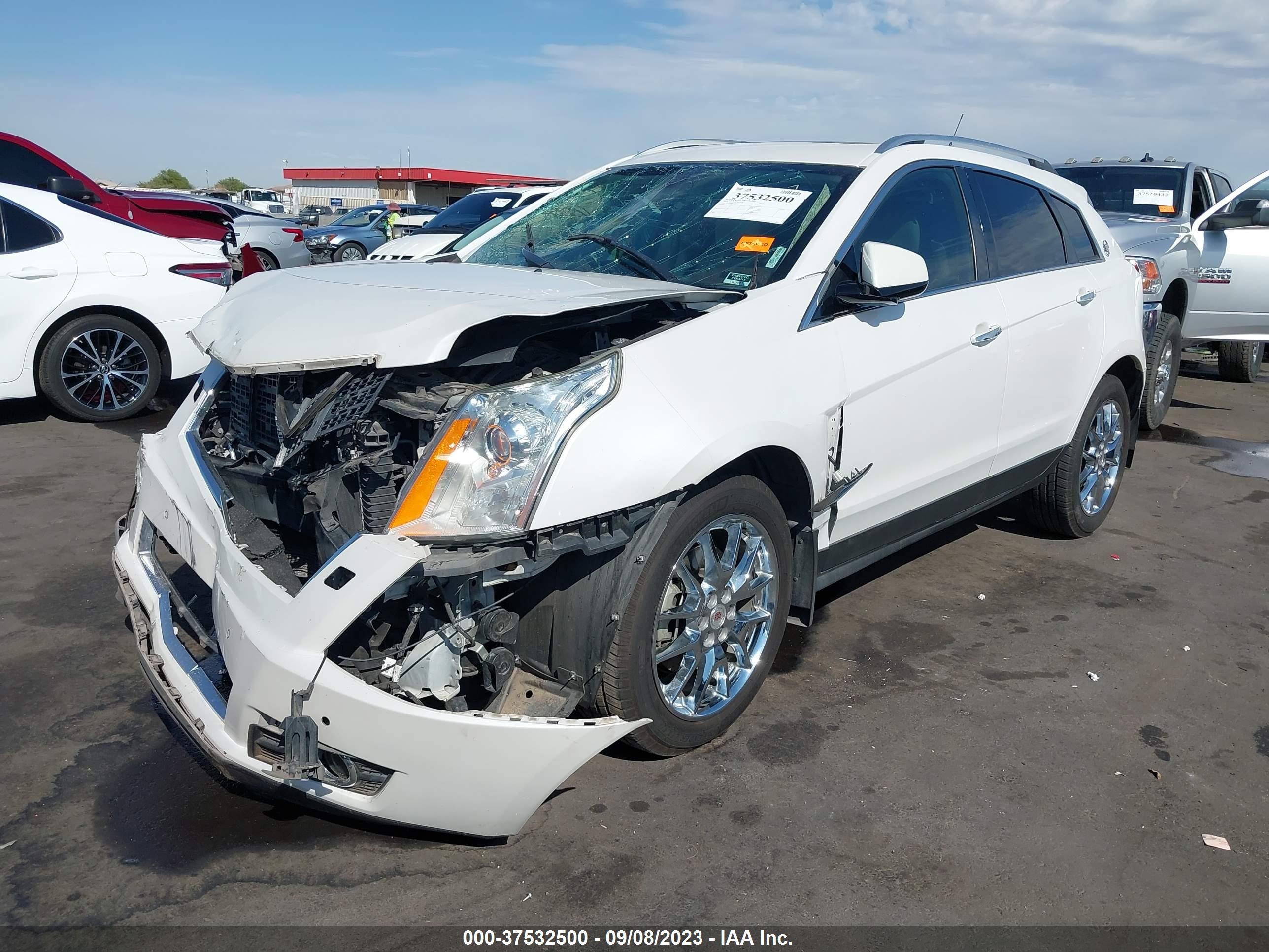 Photo 1 VIN: 3GYFNCE3XES675221 - CADILLAC SRX 