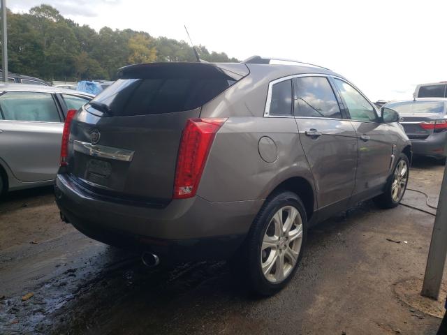 Photo 3 VIN: 3GYFNCEY4BS624062 - CADILLAC SRX PREMIU 