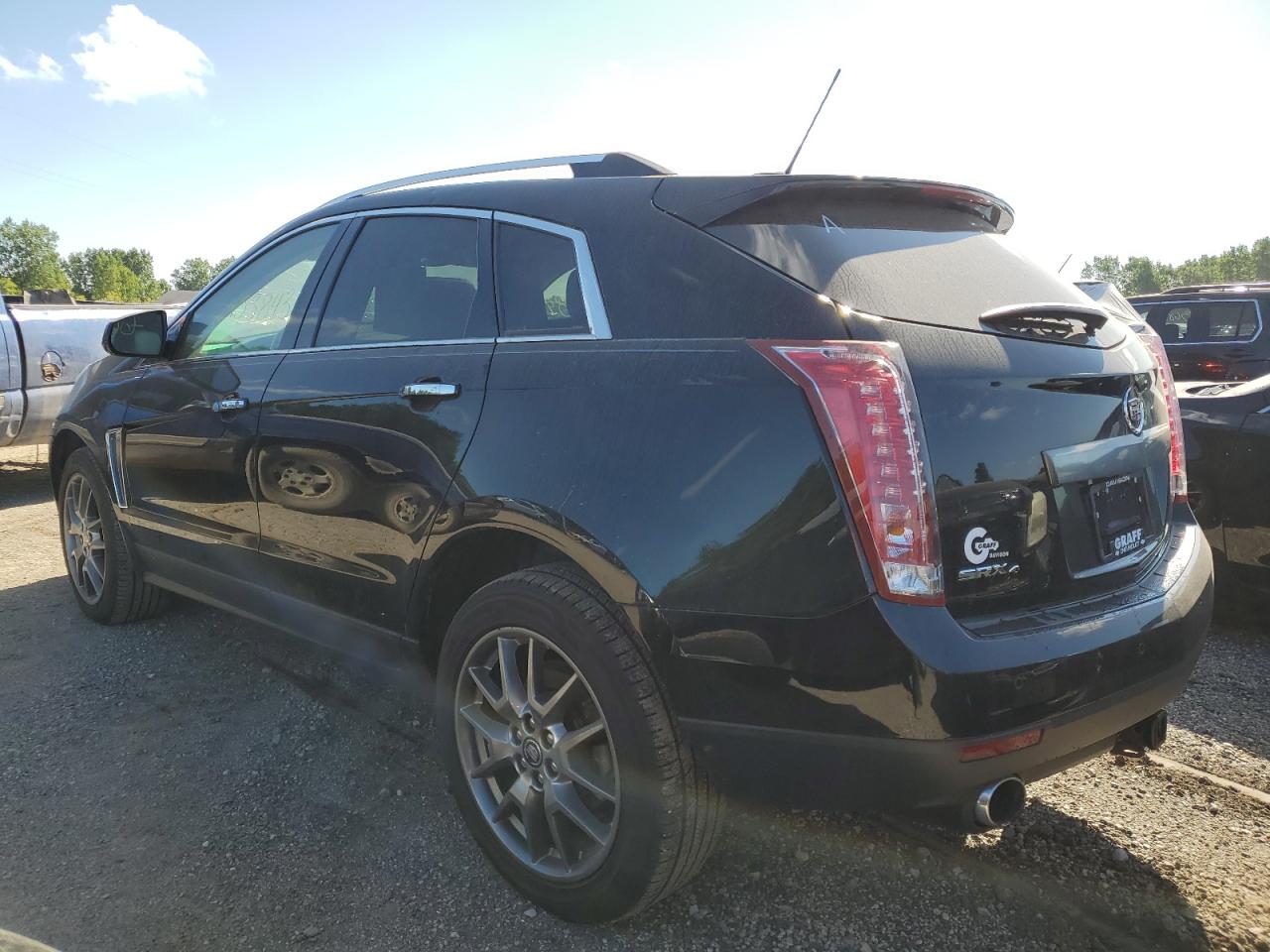 Photo 1 VIN: 3GYFNDE30GS569742 - CADILLAC SRX 