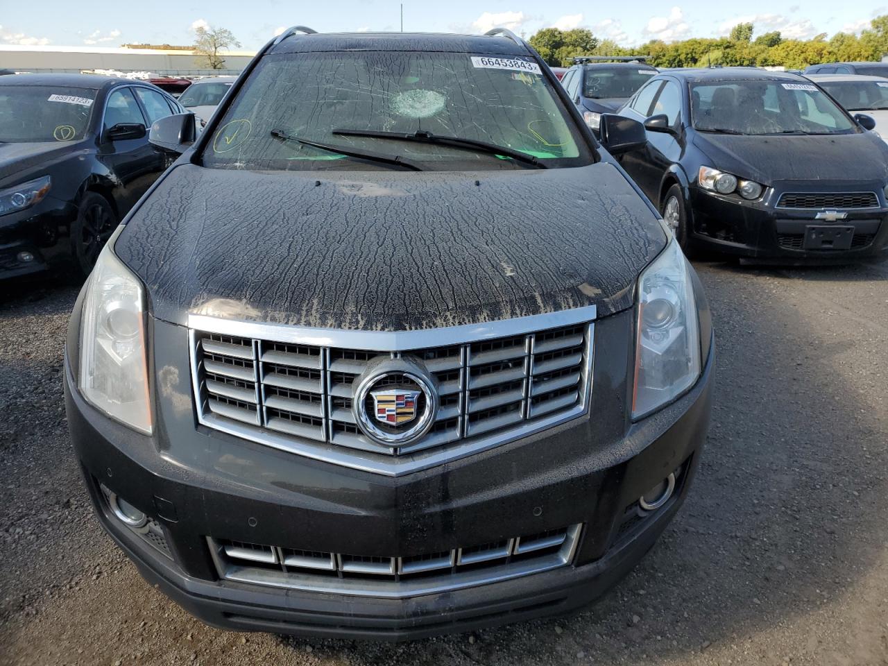 Photo 4 VIN: 3GYFNDE30GS569742 - CADILLAC SRX 