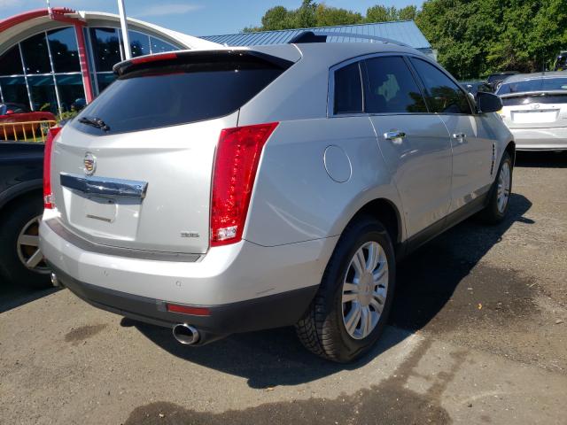 Photo 3 VIN: 3GYFNDE31CS504313 - CADILLAC SRX LUXURY 