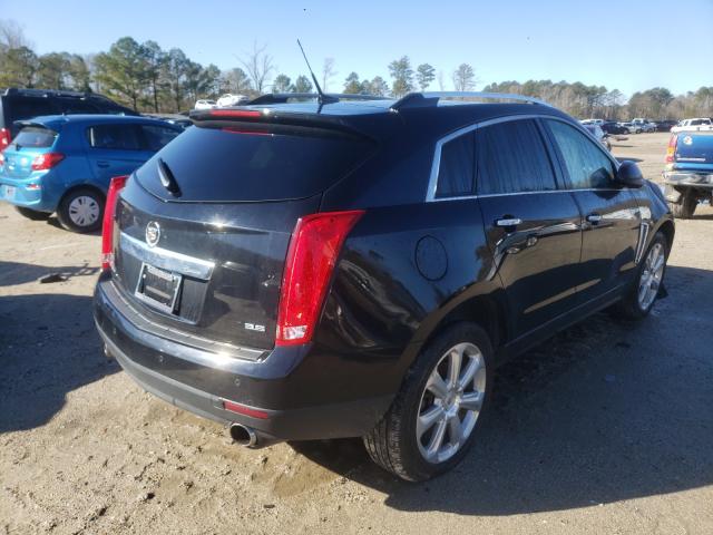 Photo 3 VIN: 3GYFNDE31DS638644 - CADILLAC SRX PERFOR 