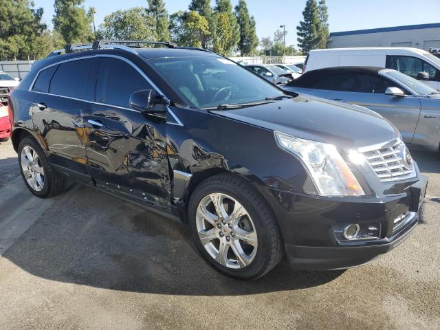 Photo 3 VIN: 3GYFNDE31ES661066 - CADILLAC SRX PREMIU 