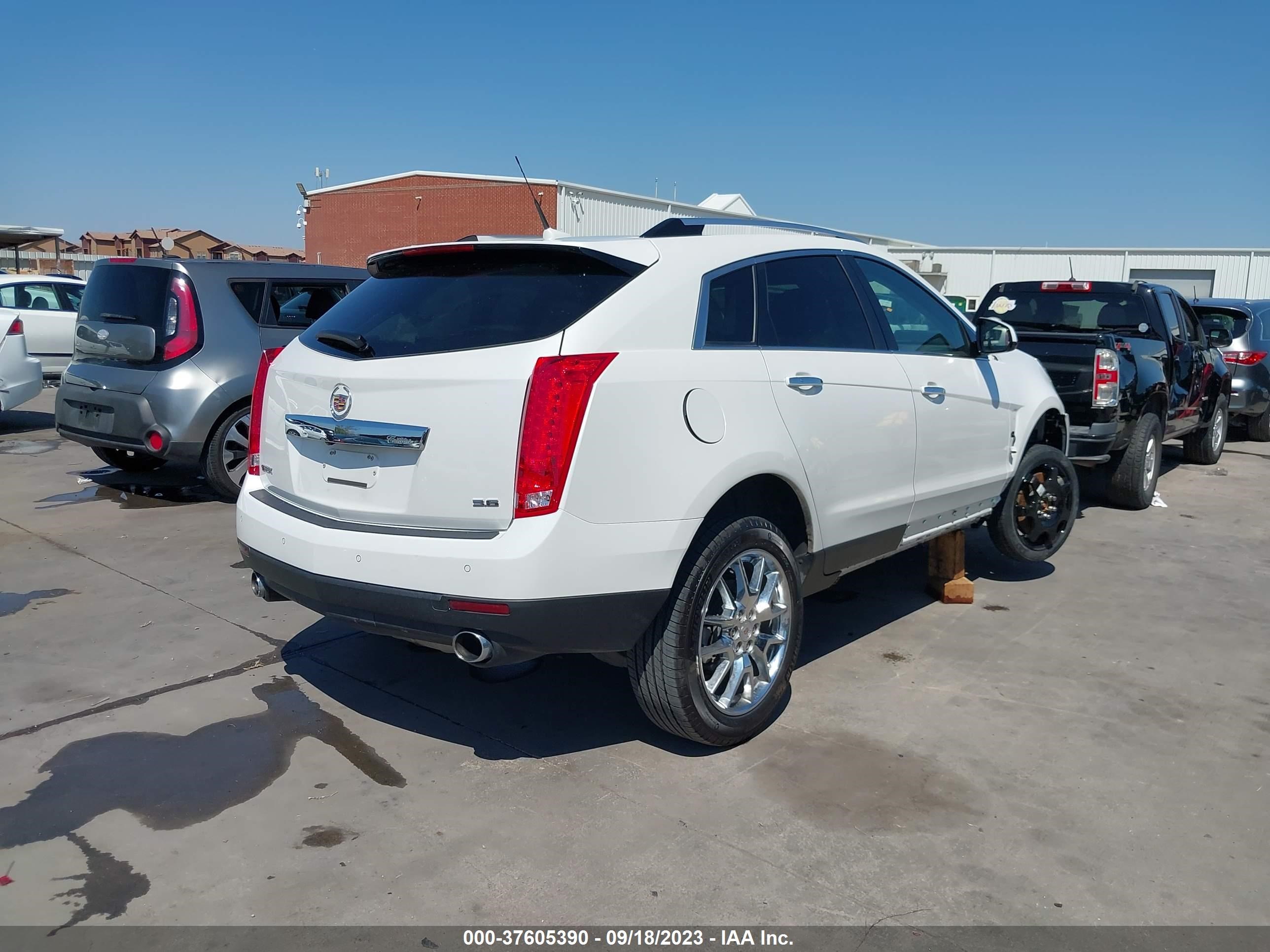 Photo 3 VIN: 3GYFNDE31ES663495 - CADILLAC SRX 