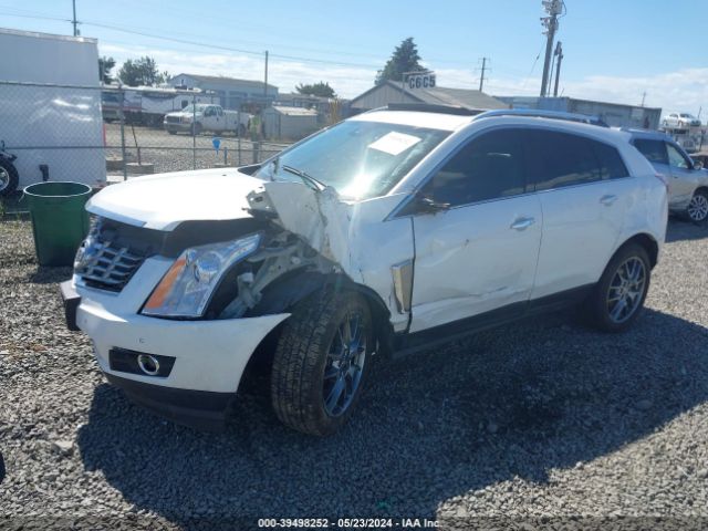 Photo 1 VIN: 3GYFNDE31GS563948 - CADILLAC SRX 