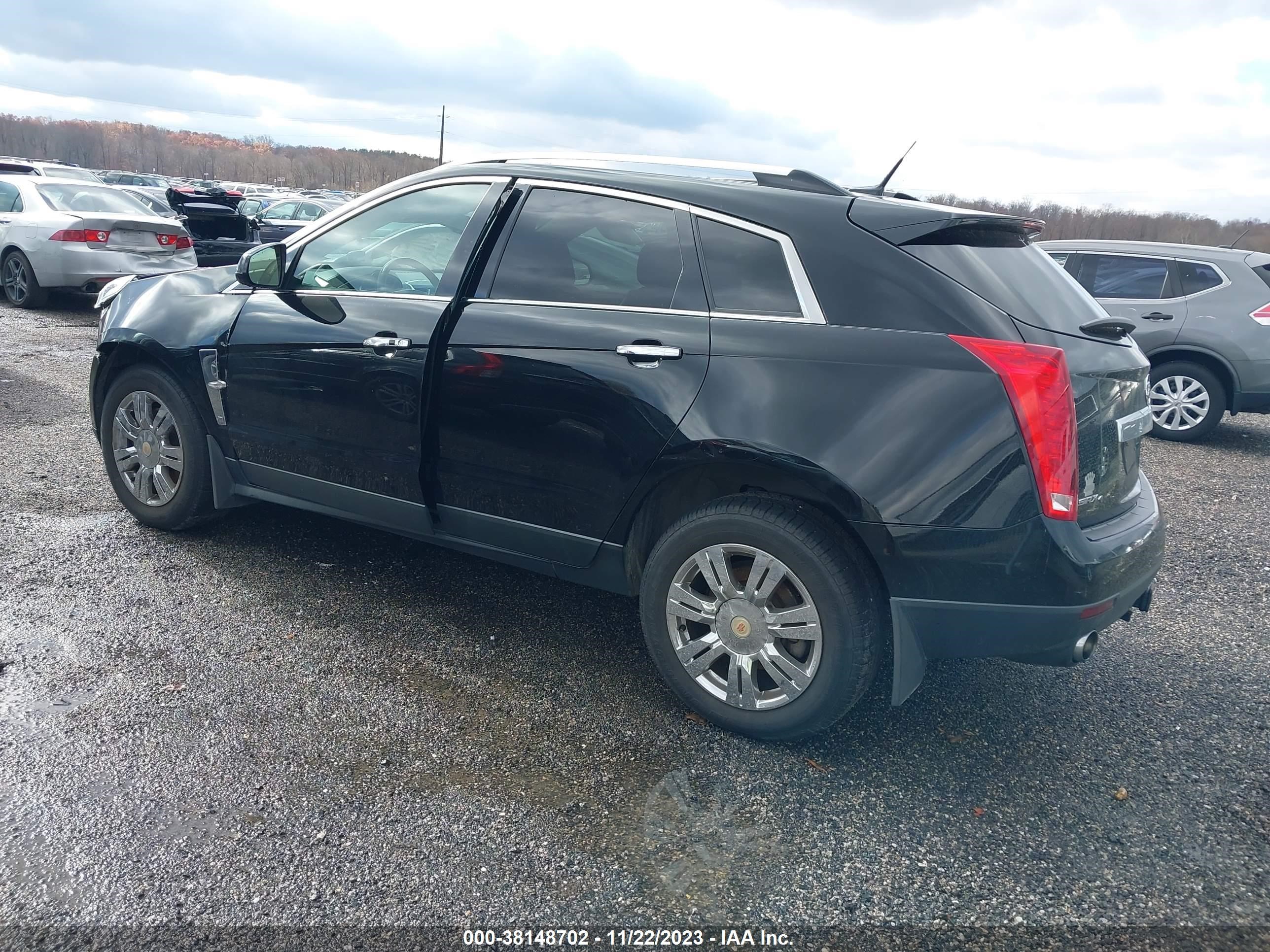 Photo 2 VIN: 3GYFNDE32CS500822 - CADILLAC SRX 