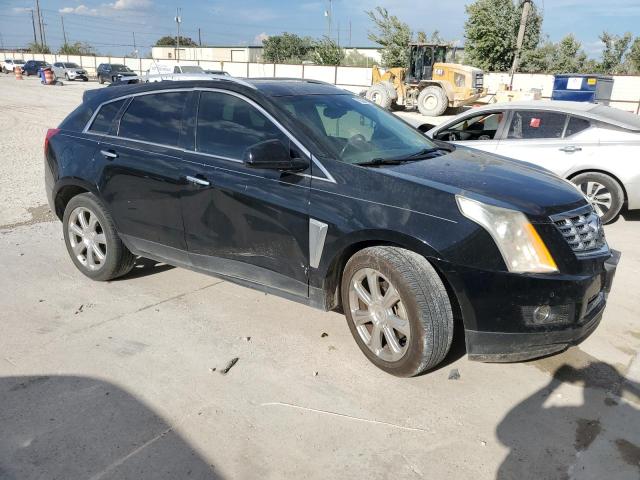 Photo 3 VIN: 3GYFNDE32GS578202 - CADILLAC SRX PREMIU 